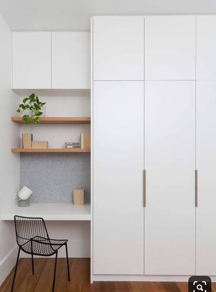 Planned wardrobe featuring a desk, perfect for small rooms.