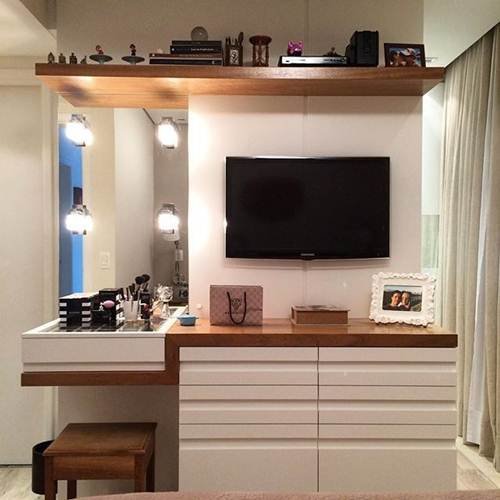 image of a dark wooden piece contrasting a white desk with drawers