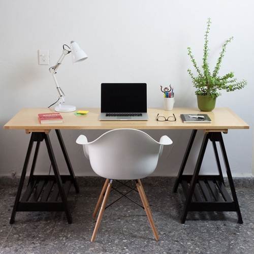 image of a desk featuring trestles for a casual style