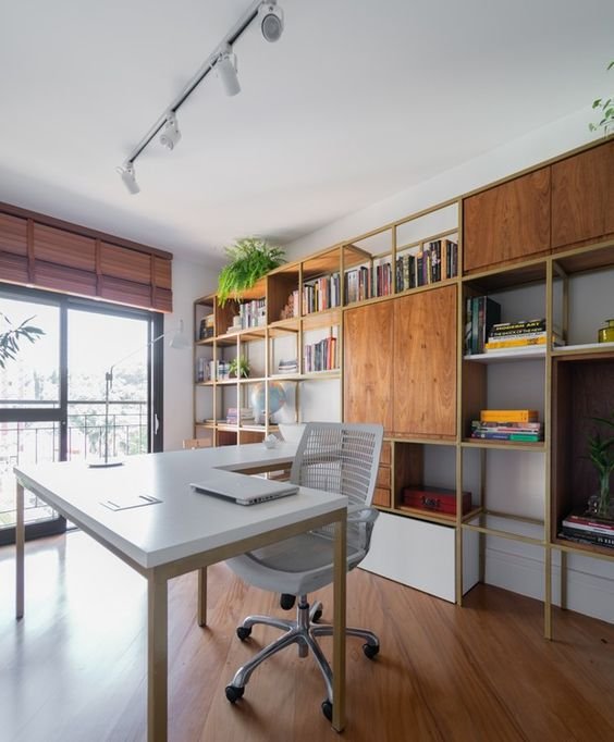 This is a beautiful inspiration for a bookshelf that features visible parts for book organization and closed sections for other items.