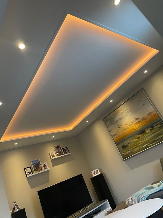 Elegant cornice enhancing light distribution in the room.