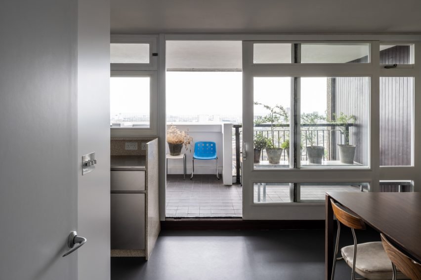 Balcony of Trellick apartment showing flooring and interior details.