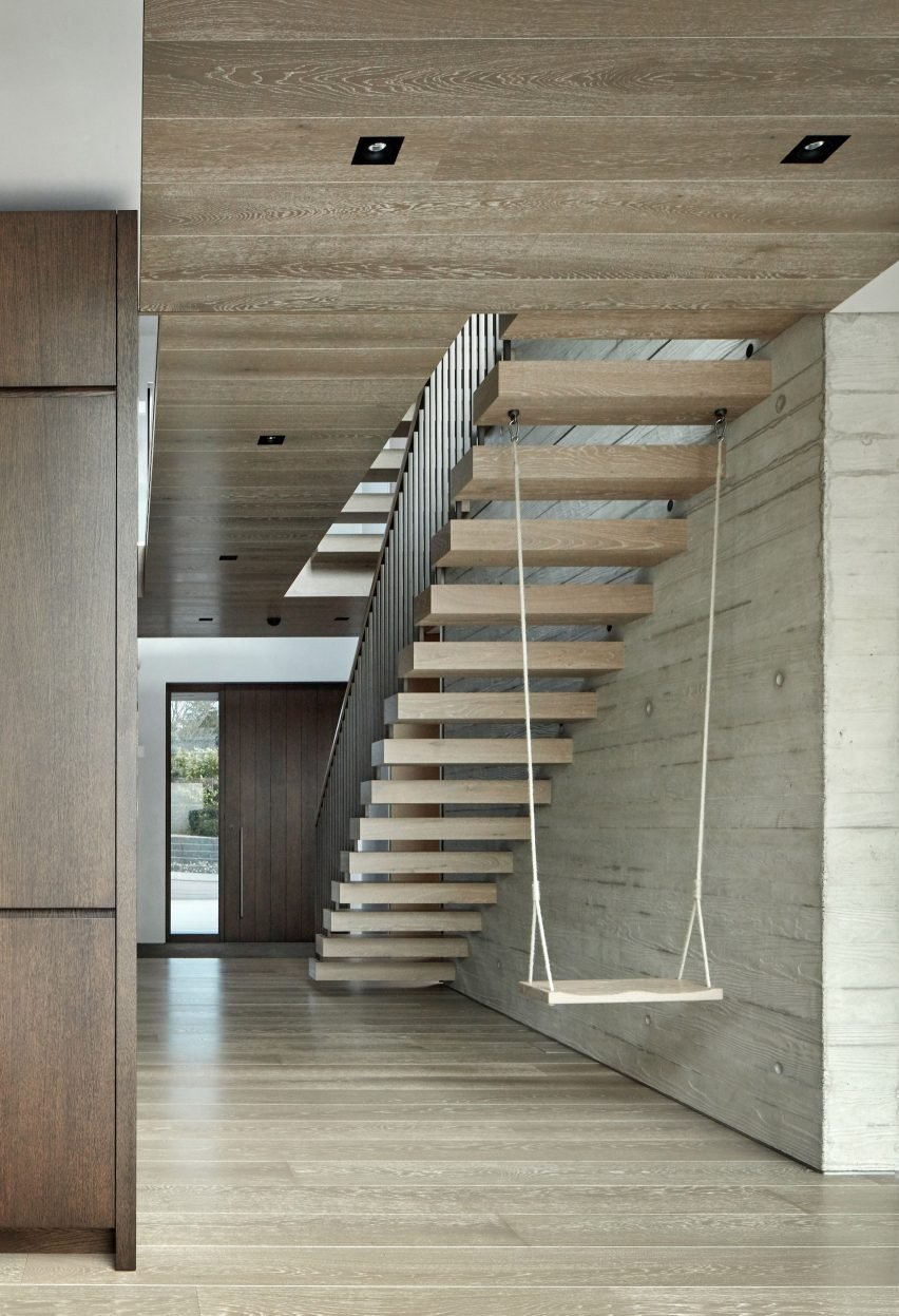 Kenwood Lee House with a cantilevered floating stair anchoring a swing