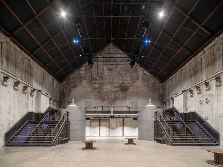 Stairs lead up to a platform in the exhibition hall