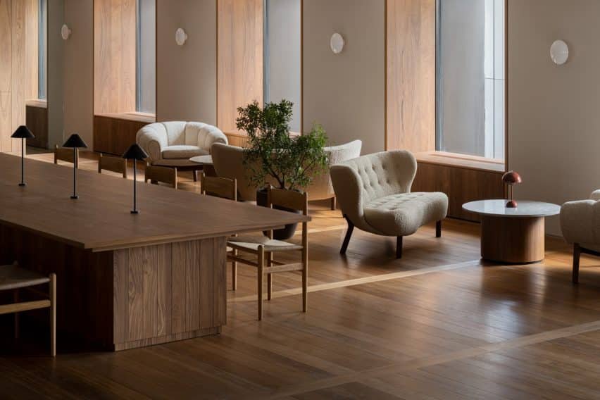 Different seating areas offer a variety of working environments within the office.