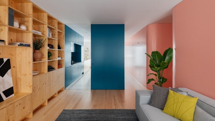 The hero image showcases the vibrant interior of the São Sebastião 123 apartment by ALARQUITECTOS, featuring a blend of color-blocked walls.