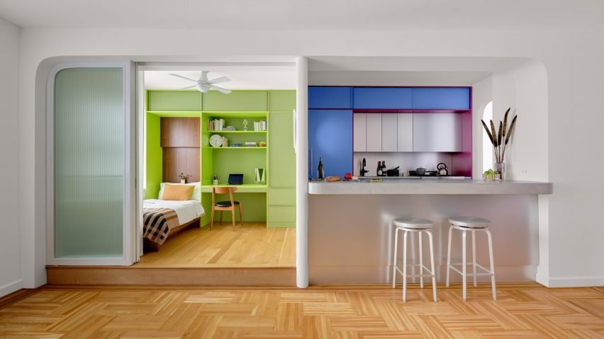 An apartment with bright colors that showcases the renovation by Ideas of Order.