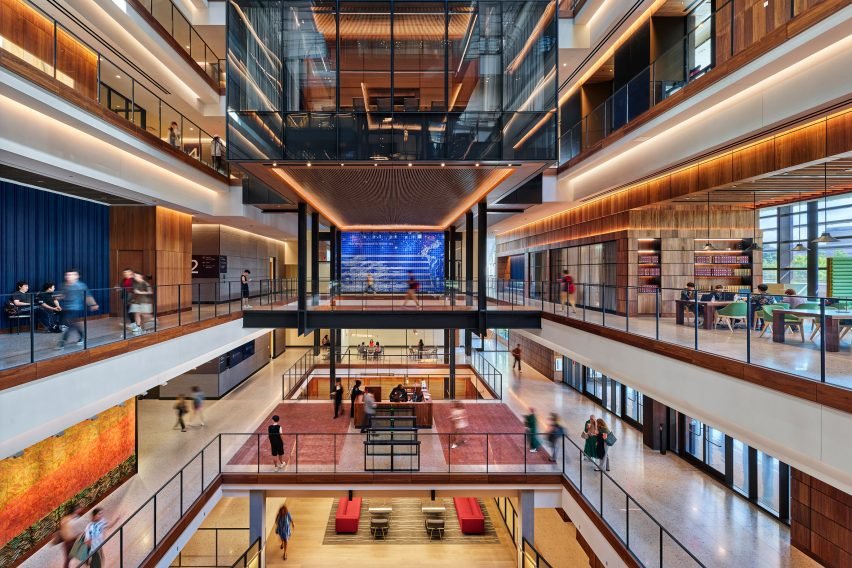 A shot of the central atrium packed with learning areas and lounge spaces.