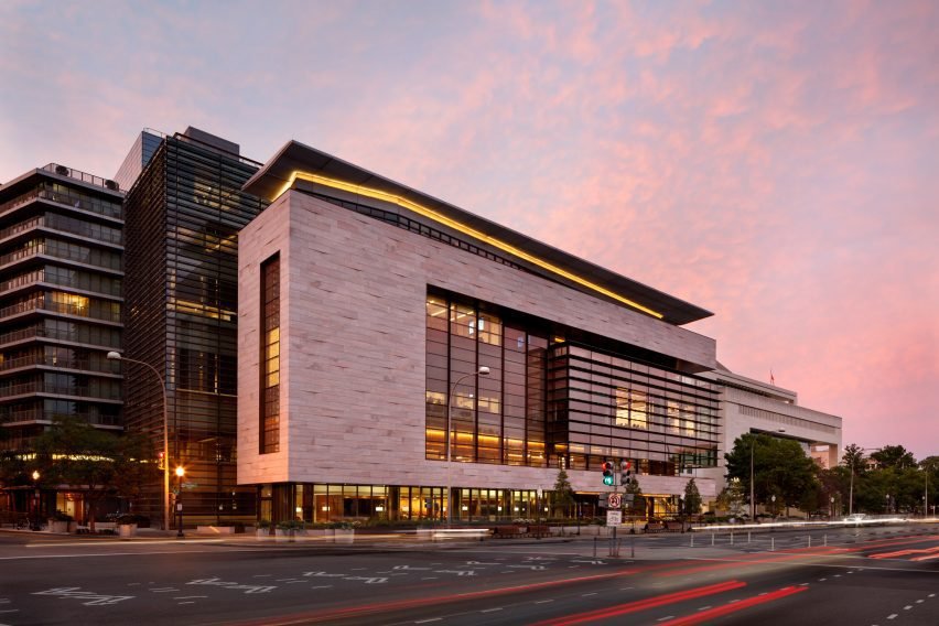 Exterior view of the building highlighting the copper and bronze sunscreen features.