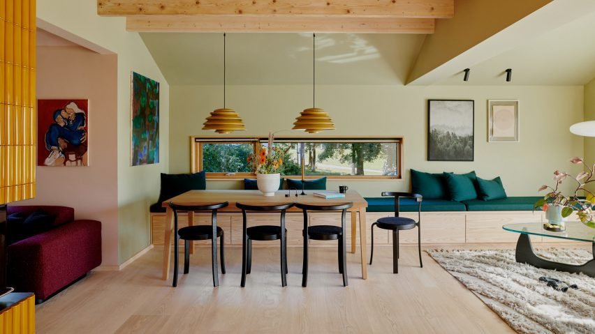 Dinning room with yellow pendants in Yellow House in the Apple Garden.