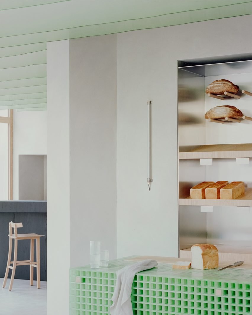 A fibreglass counter sits at the centre of the bakery